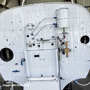 View of navion airplane engine panel after restoration clean white